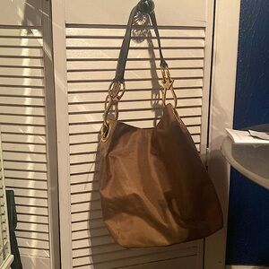 Never used excellent condition 
Shoulder bag brown leather strap brass hardware